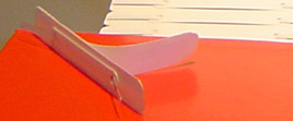 Linguette con adesivo per fogli forati